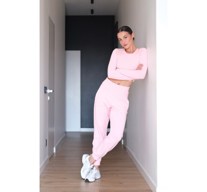 Camilla by Zenwear is a soft pink fitted long sleeve top with a clean minimalist design. 