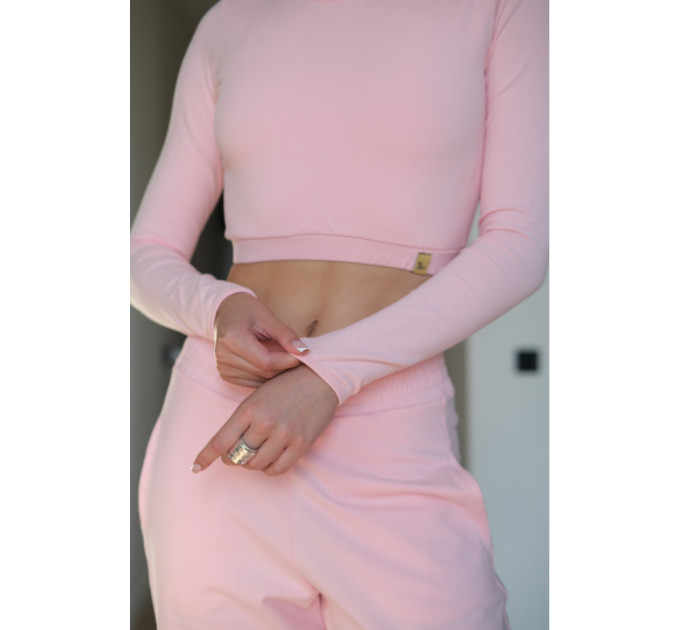 Camilla by Zenwear is a soft pink fitted long sleeve top with a clean minimalist design. 